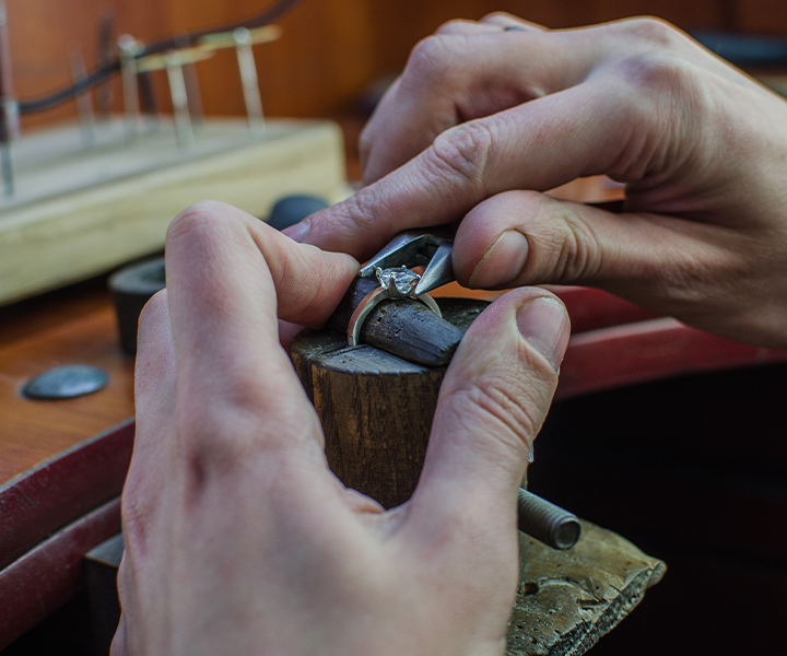 Smith Jeweler Working on an Engagement Ring Smith Jeweler Working on an Engagement Ring